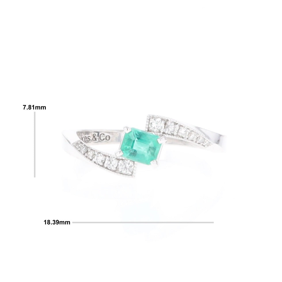 Emerald Twist Ring with Diamond Accents