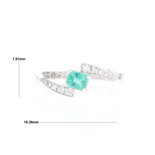 Emerald Twist Ring with Diamond Accents