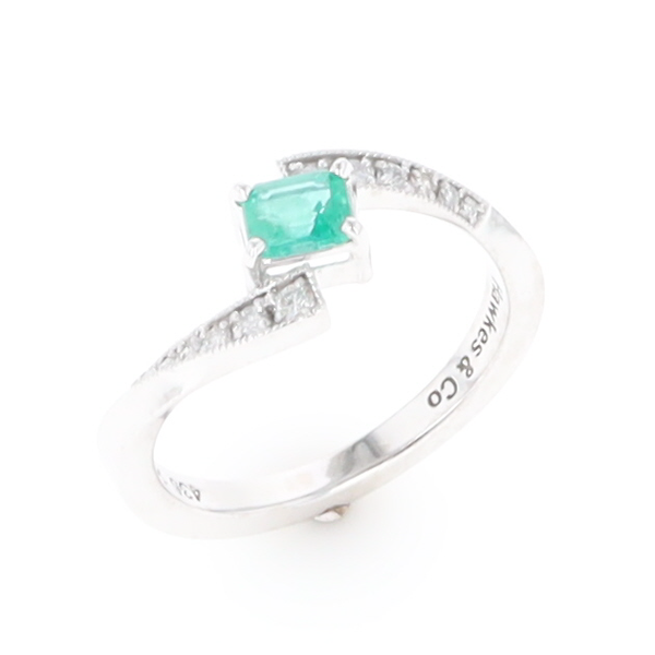 Emerald Twist Ring with Diamond Accents