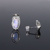 Opal Earrings Oval Inlaid with .25ctw Round Diamond Halo Studs