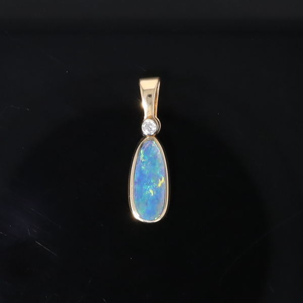 Opal Pendant Oval Inlaid Design with .02ct Round Diamond