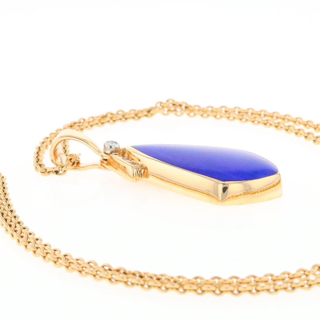 Natural Lapis pendant, tear drop inlaid design, 0.15ctw diamonds