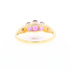 Three stone ring with amethyst