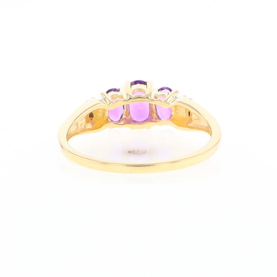 Three stone ring with amethyst