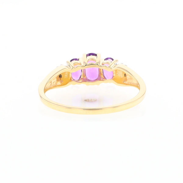 Three stone ring with amethyst