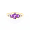 Three stone ring with amethyst