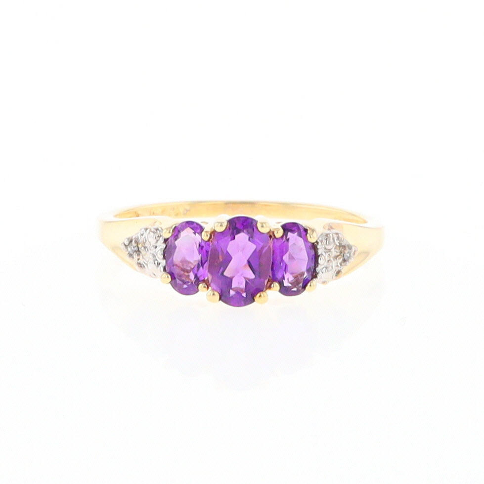 Three stone ring with amethyst