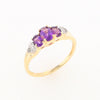 Three stone ring with amethyst