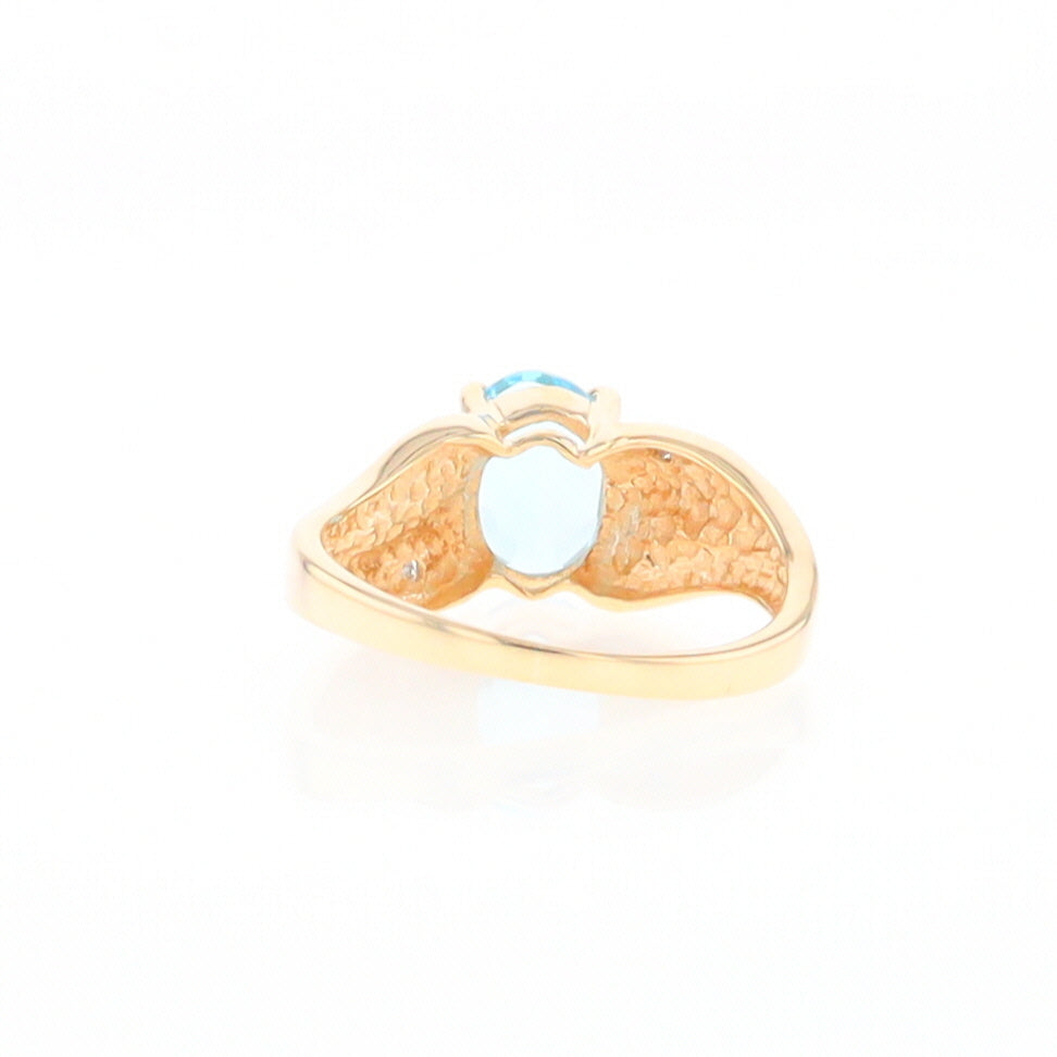 Blue Topaz Ring with Diamond Accents