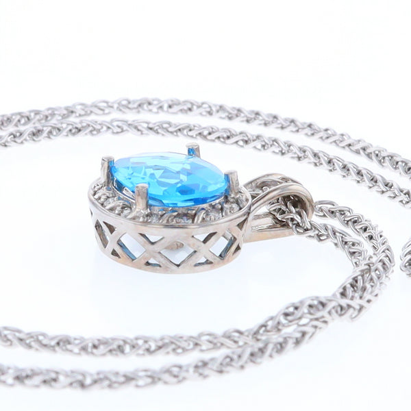 Blue Topaz Oval Halo Pendant