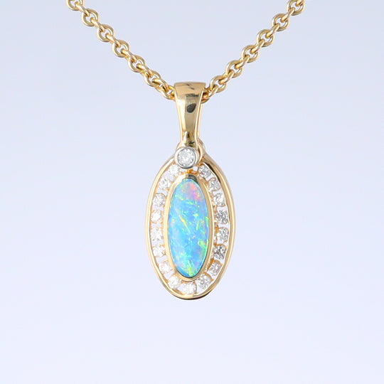 Opal Pendant Oval Inlaid Design with .22ctw Round Diamonds Halo