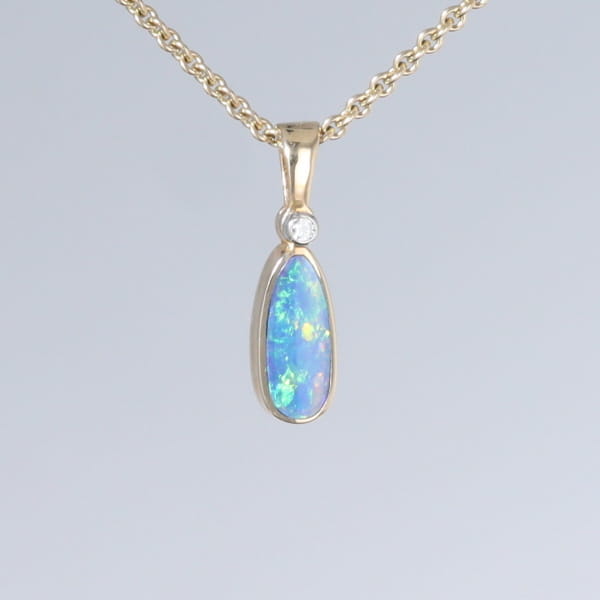 Opal Pendant Oval Inlaid Design with .02ct Round Diamond