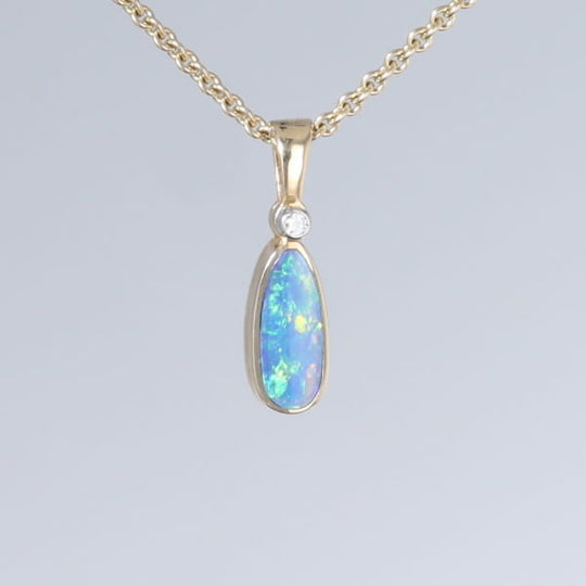 Opal Pendant Oval Inlaid Design with .02ct Round Diamond