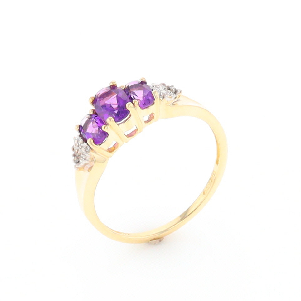 Three stone ring with amethyst