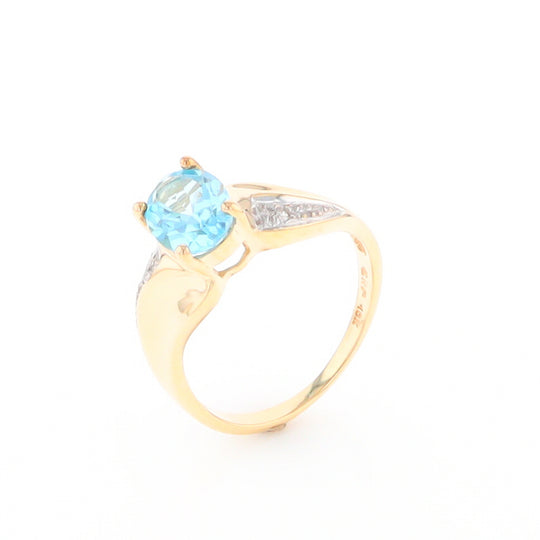 Blue Topaz Ring with Diamond Accents