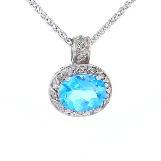 Blue Topaz Oval Halo Pendant