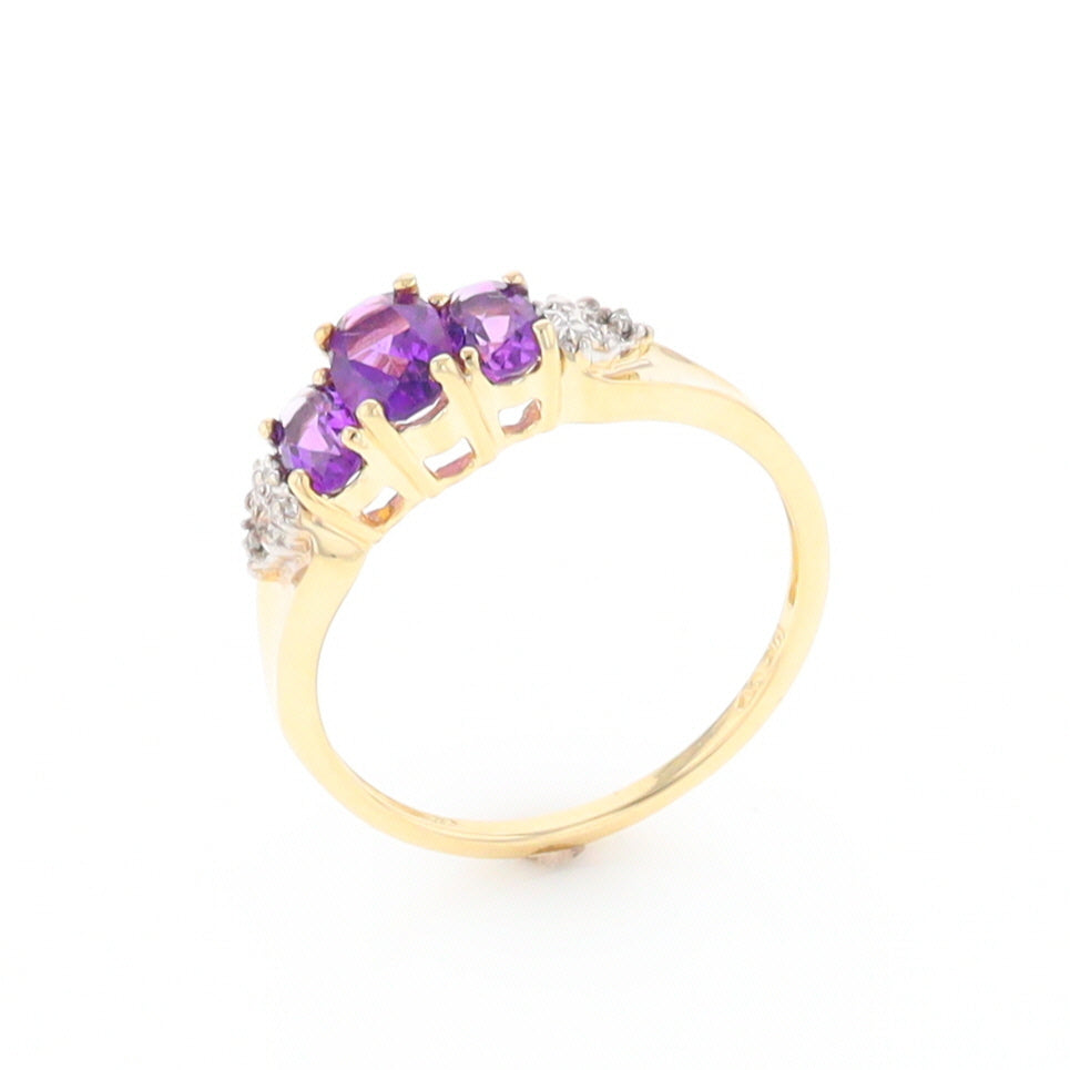 Three stone ring with amethyst