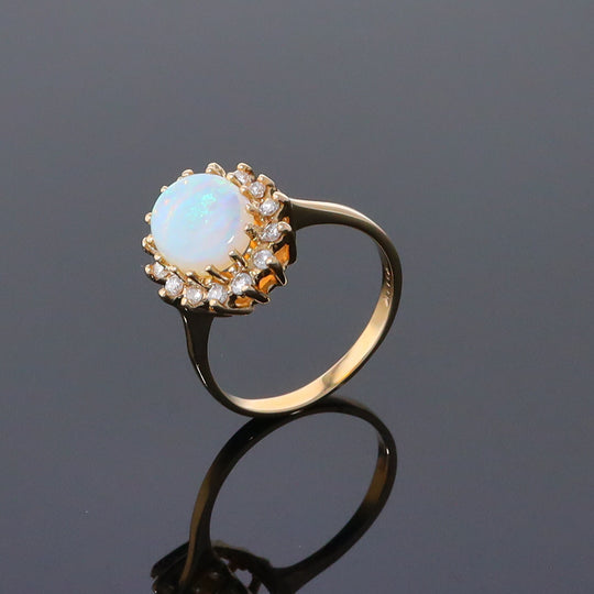 Oval Cabochon Opal with Diamond Halo Ring