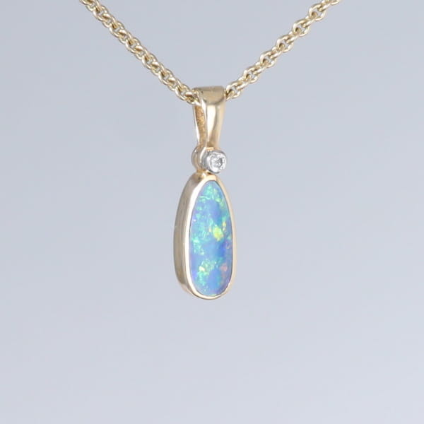 Opal Pendant Oval Inlaid Design with .02ct Round Diamond