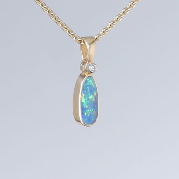 Opal Pendant Oval Inlaid Design with .02ct Round Diamond