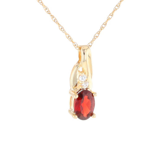 Oval Garnet Pendant with Cubic Zirconia Accents