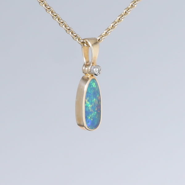 Opal Pendant Oval Inlaid Design with .02ct Round Diamond