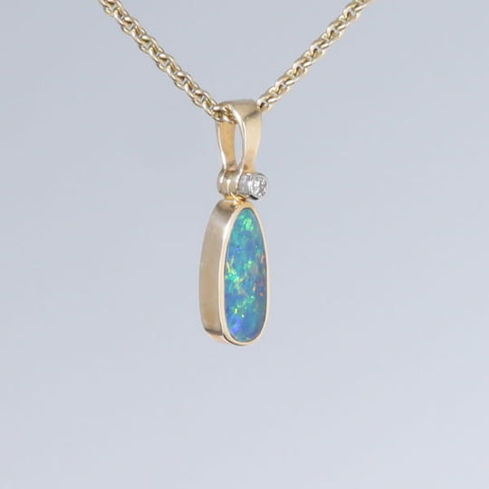 Opal Pendant Oval Inlaid Design with .02ct Round Diamond