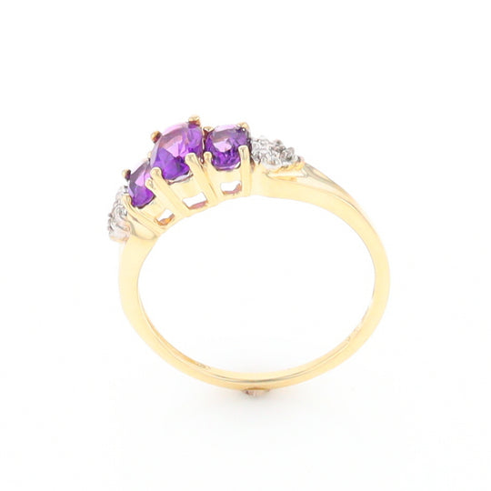 Three stone ring with amethyst