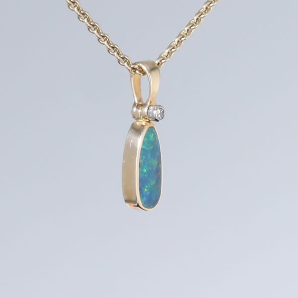 Opal Pendant Oval Inlaid Design with .02ct Round Diamond