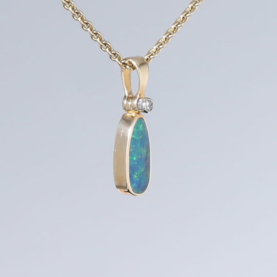 Opal Pendant Oval Inlaid Design with .02ct Round Diamond