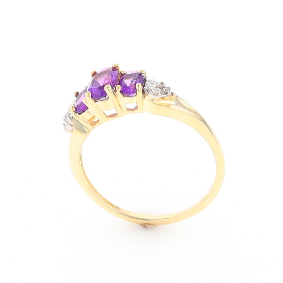 Three stone ring with amethyst