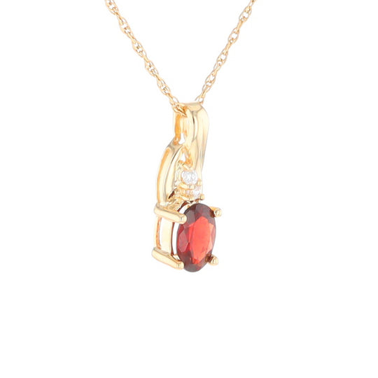Oval Garnet Pendant with Cubic Zirconia Accents