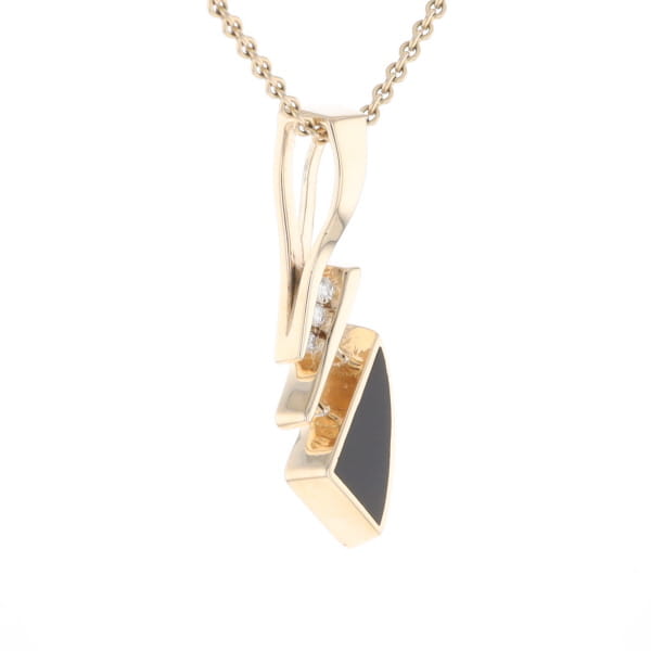 Retro Style Triangular Onyx Inlaid Pendant with .07ctw Diamonds