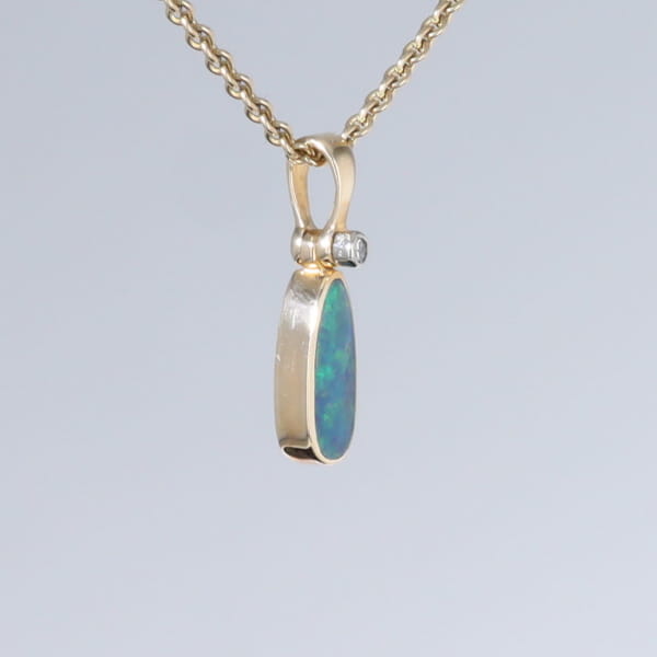 Opal Pendant Oval Inlaid Design with .02ct Round Diamond