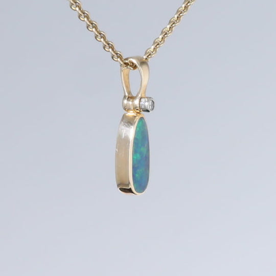Opal Pendant Oval Inlaid Design with .02ct Round Diamond