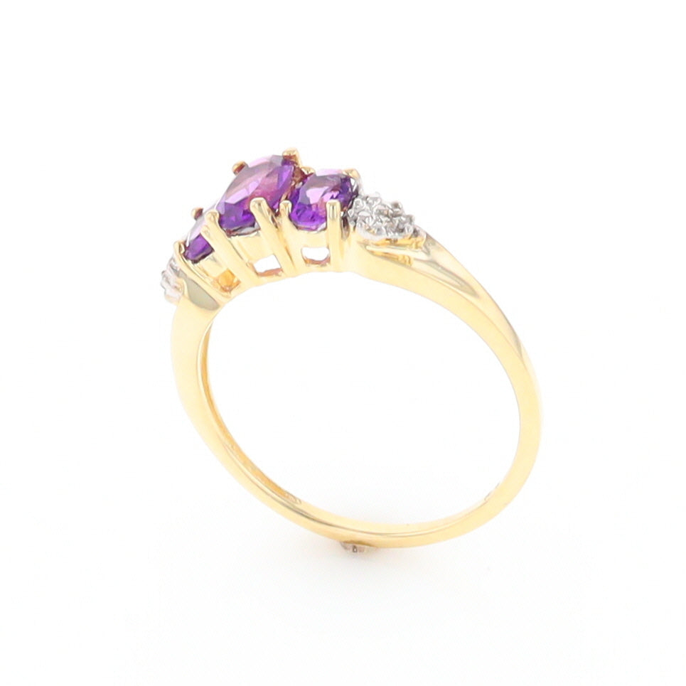 Three stone ring with amethyst