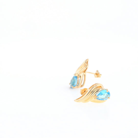 Blue Topaz Swirl Pear Stud Earrings