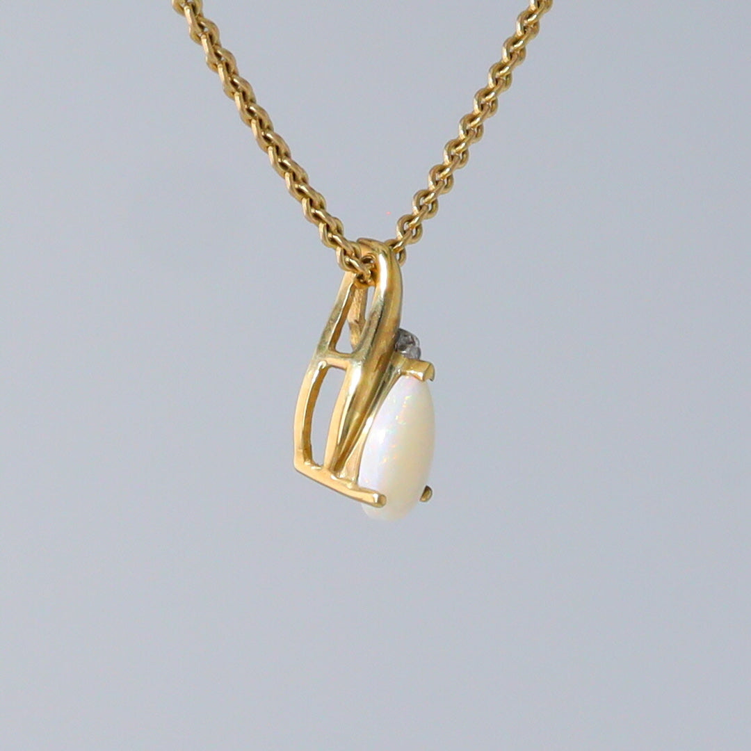 Natural Opal Pear Swirl Pendant with Diamond Accent