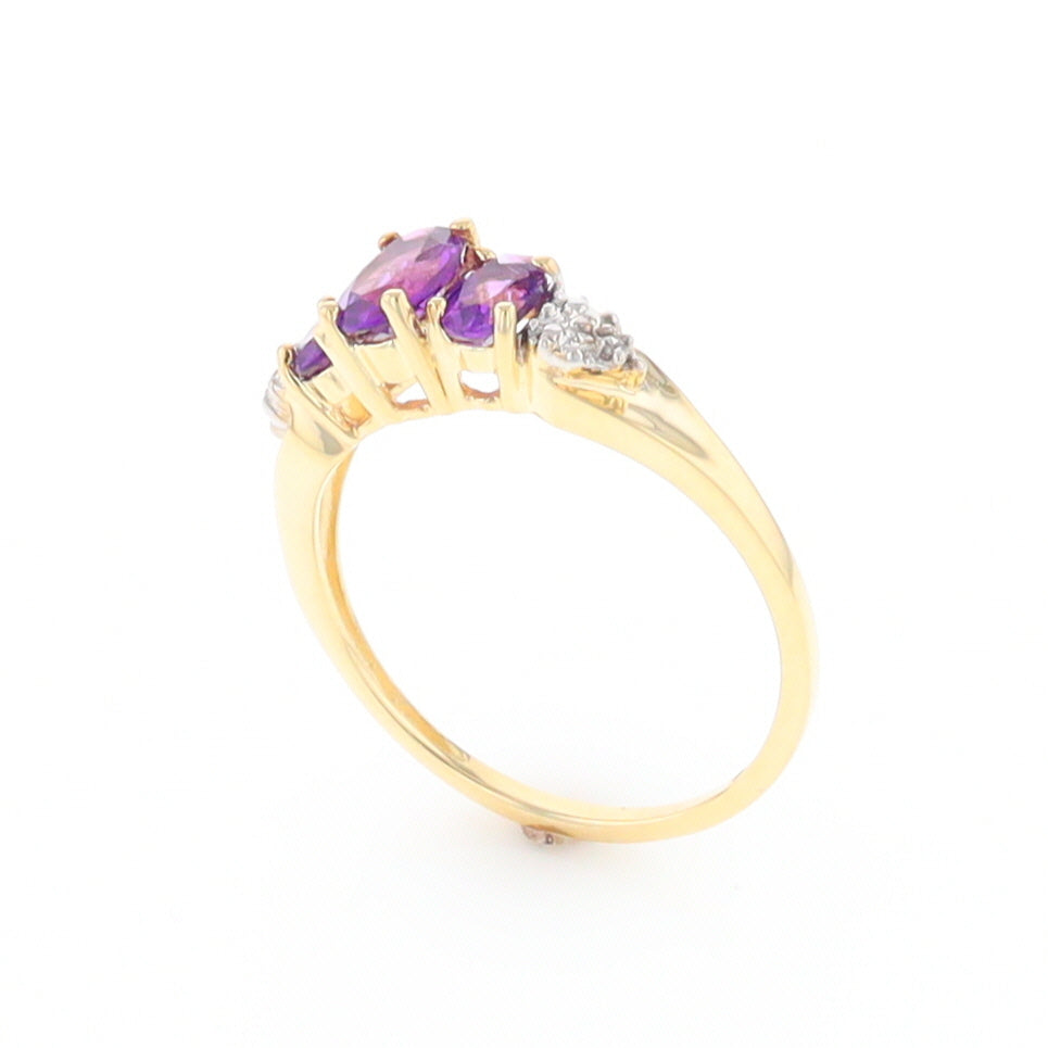 Three stone ring with amethyst