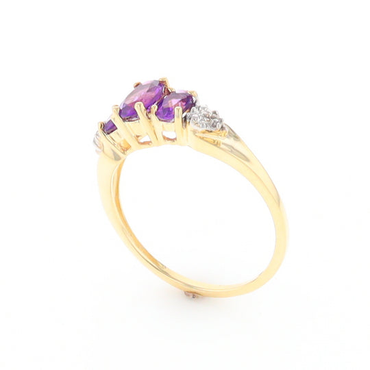 Three stone ring with amethyst