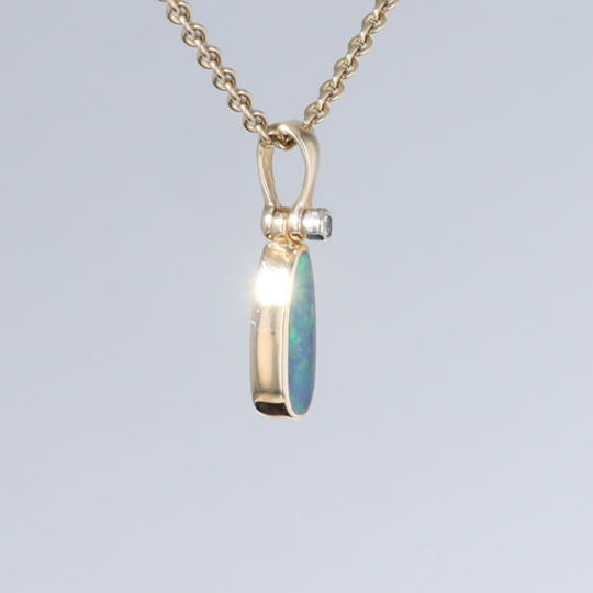 Opal Pendant Oval Inlaid Design with .02ct Round Diamond