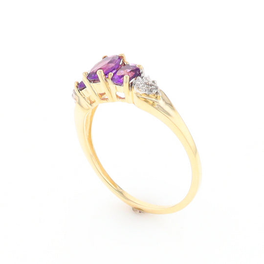 Three stone ring with amethyst