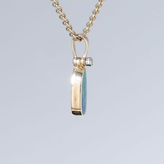 Opal Pendant Oval Inlaid Design with .02ct Round Diamond
