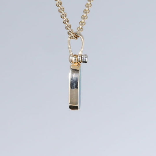 Opal Pendant Oval Inlaid Design with .02ct Round Diamond