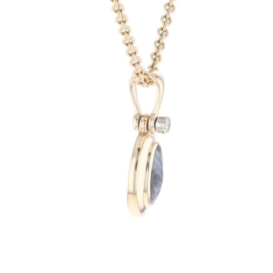 Natural pietersite oval inlaid .02ctw diamond pendant