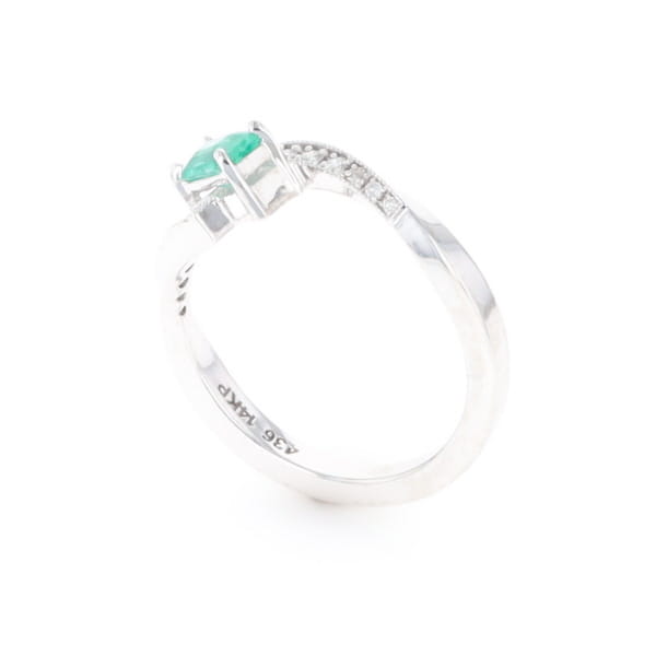 Emerald Twist Ring with Diamond Accents