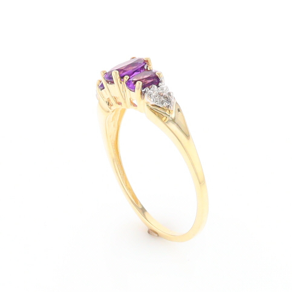 Three stone ring with amethyst