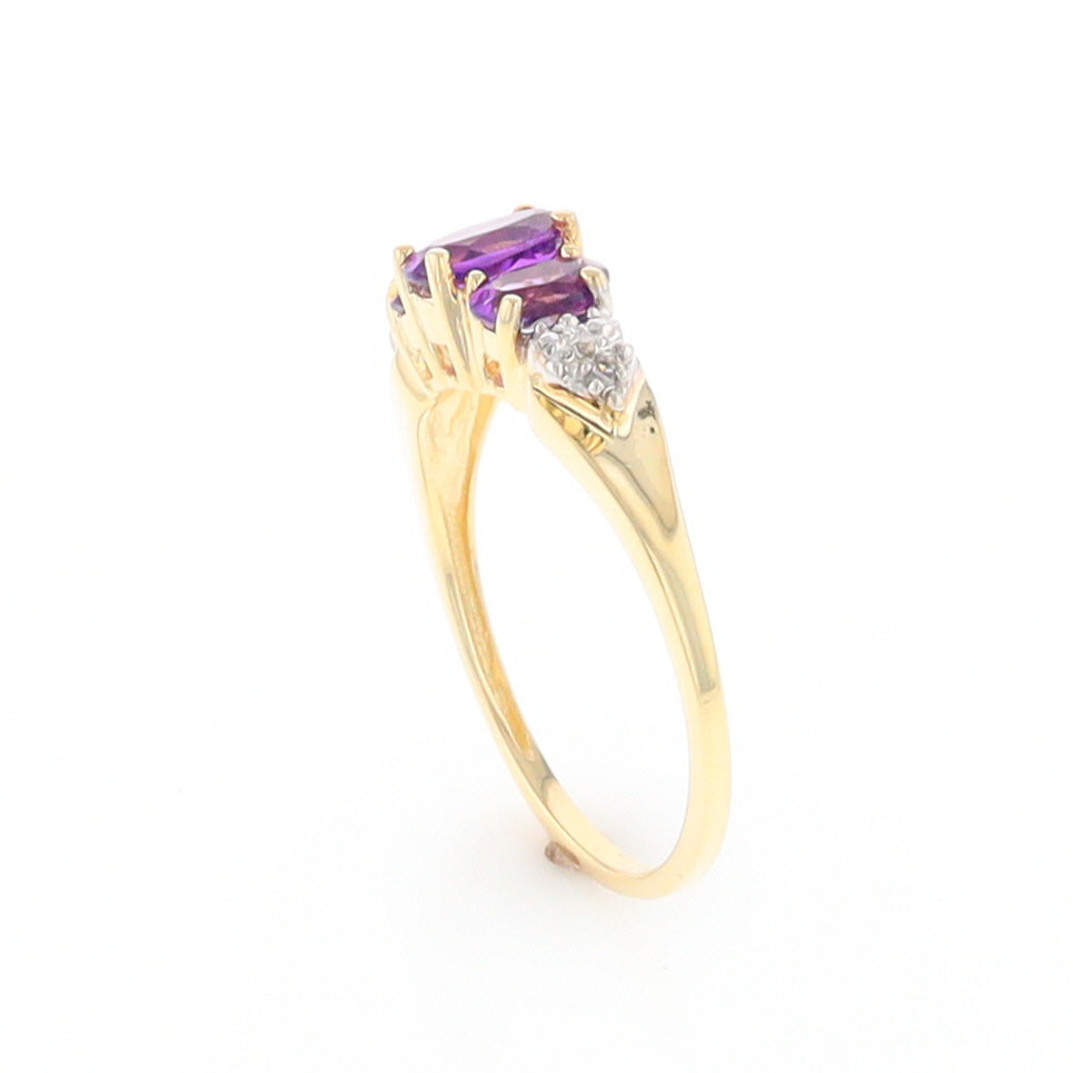 Three stone ring with amethyst