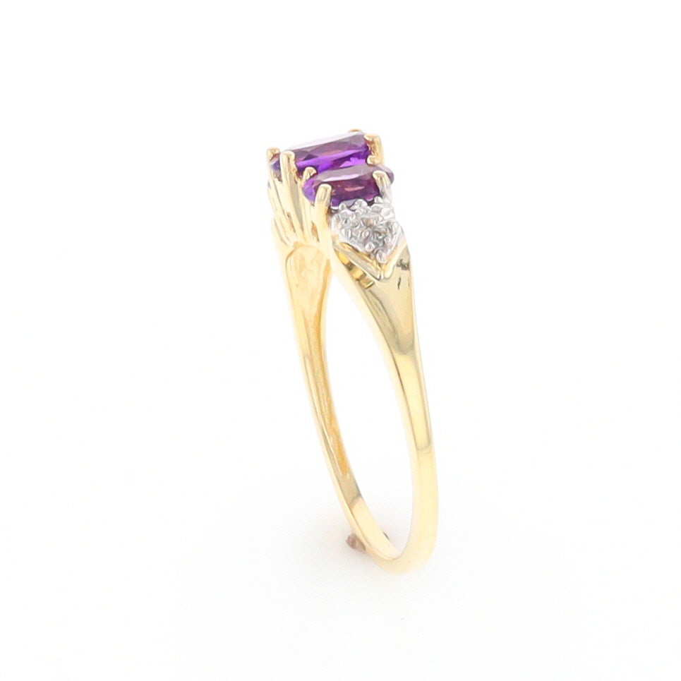 Three stone ring with amethyst