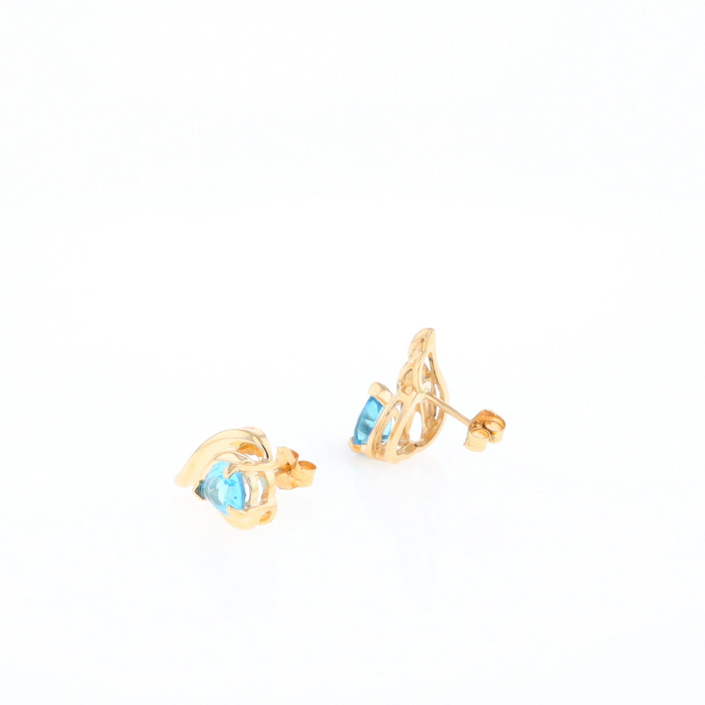 Blue Topaz Swirl Pear Stud Earrings